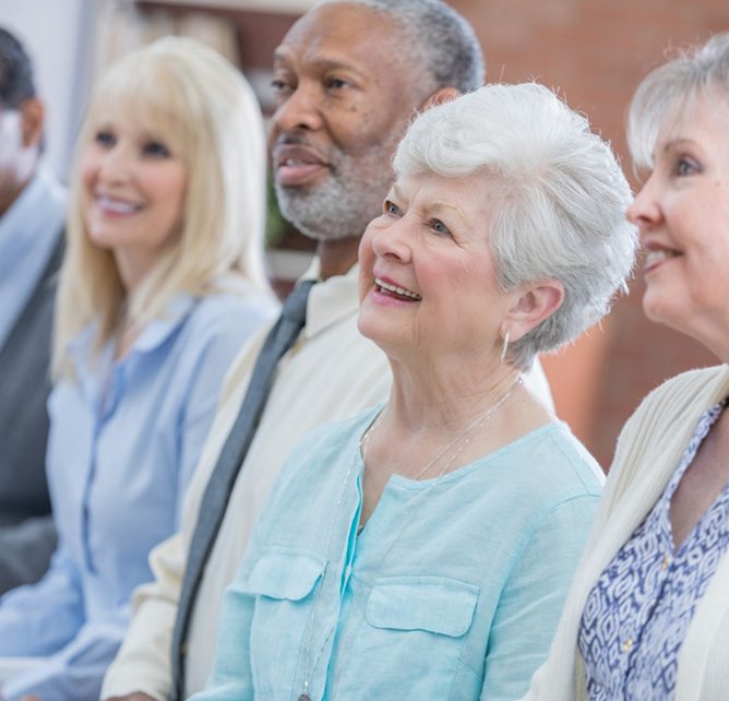 small group of retirees attending a seminar